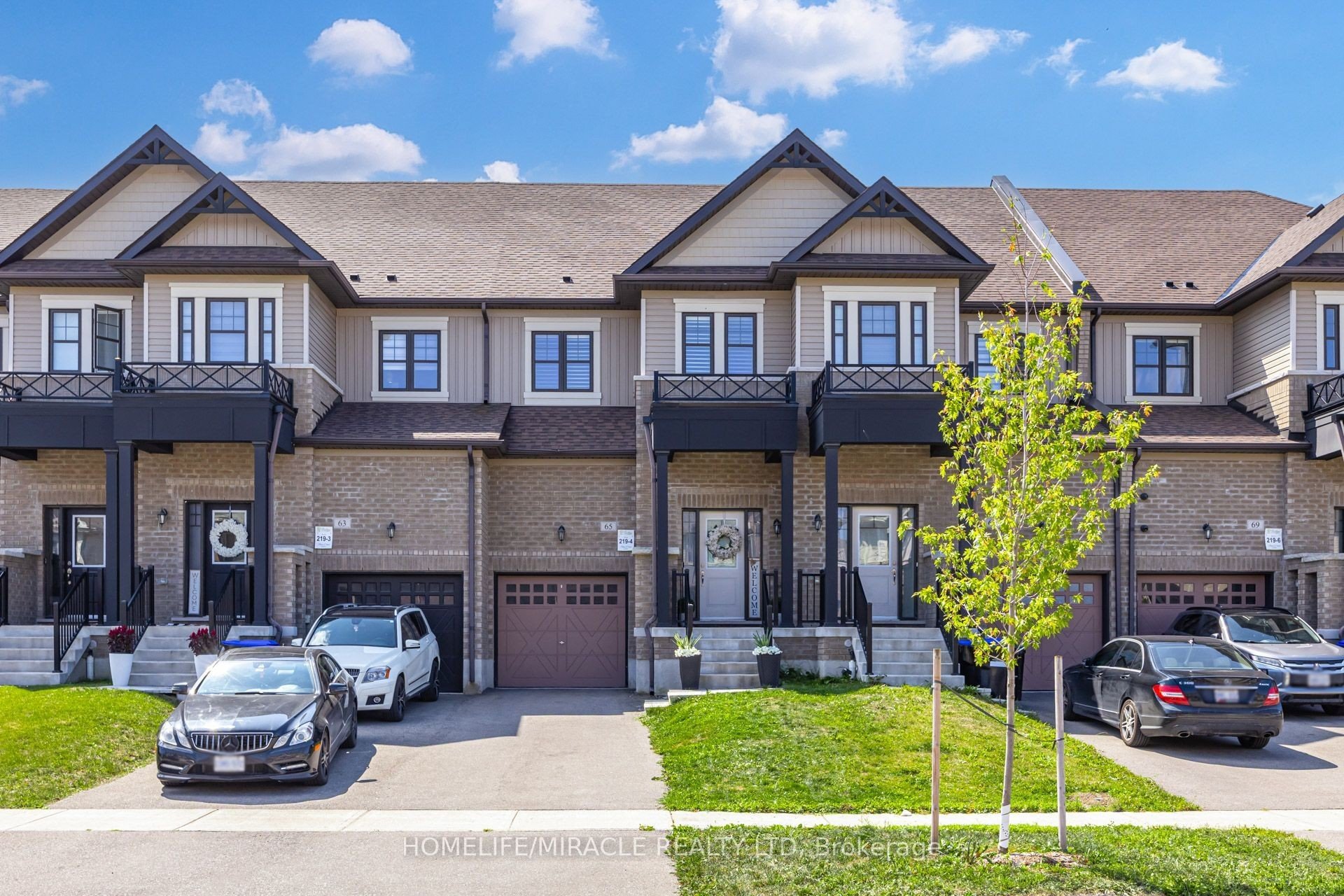 65 Lorne Thomas Place, a freehold townhouse in Treetops